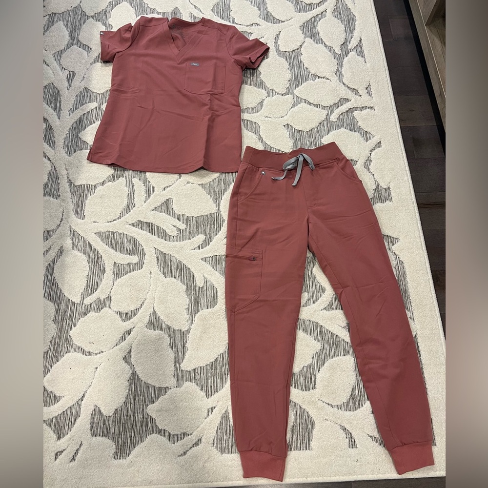 Worn once. Cantanna scrub top and joggers. Excellent condition